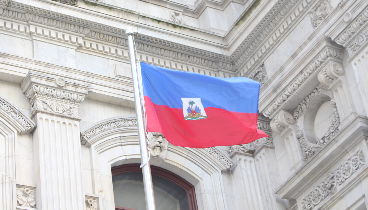 The Haitian flag was raised near City Hall on Haitian Flag Day, May 18. Photo: Jensen Toussaint/AL DÍA News.