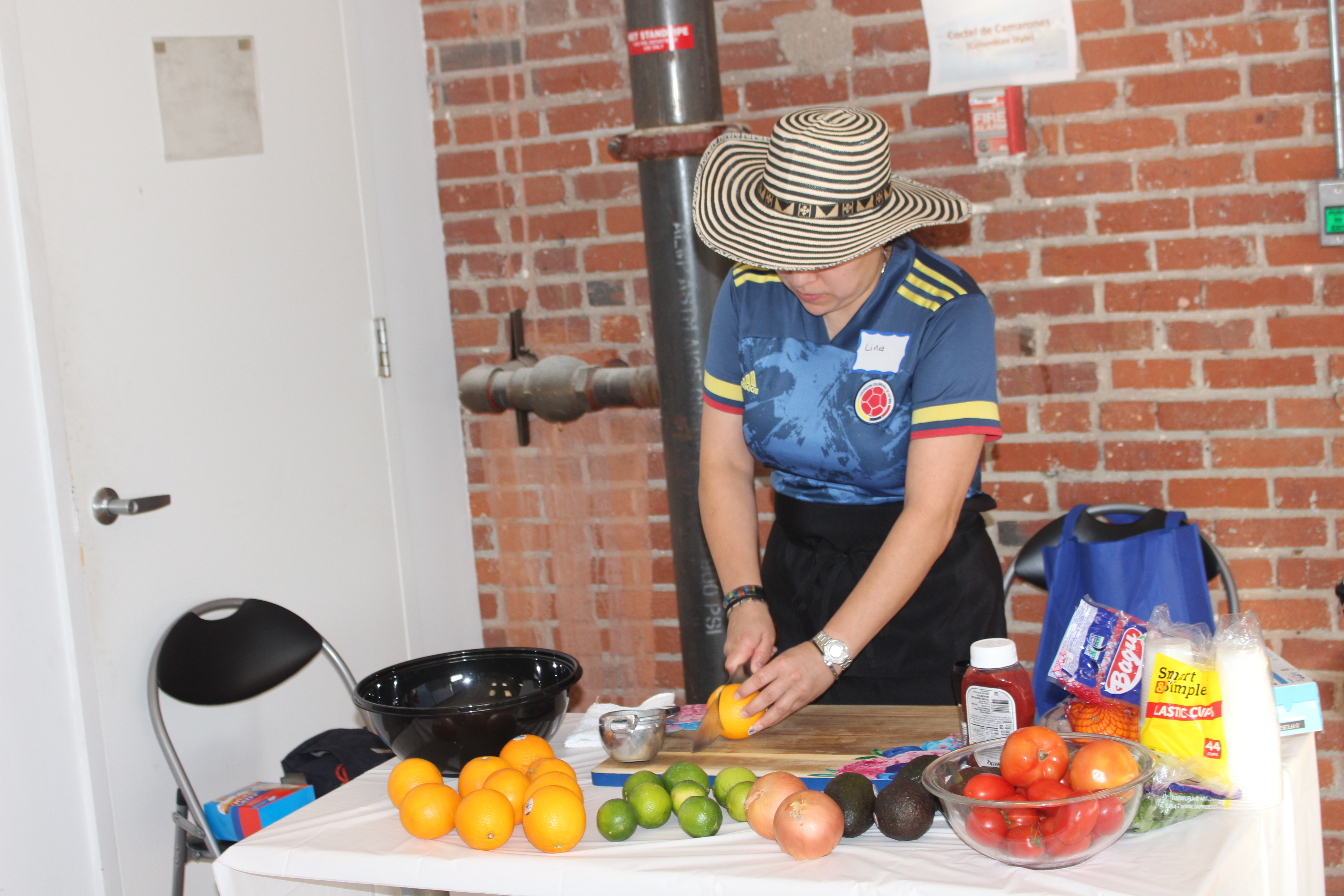 A cooking demonstration for Coctel de Camarones. Photo: Jensen Toussaint/AL DÍA News.