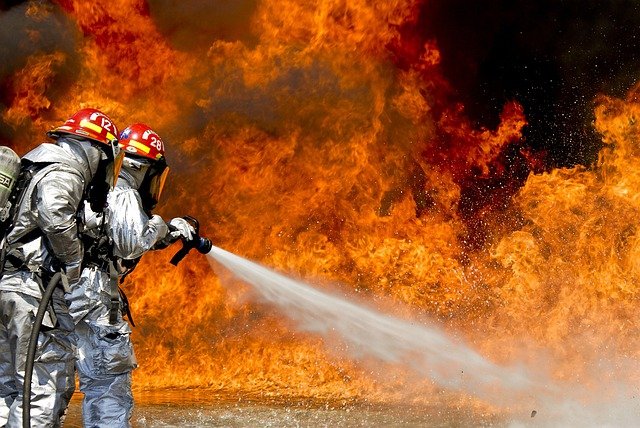 Firefighters battling against a wild forrest fire. Photo: Pixabay.