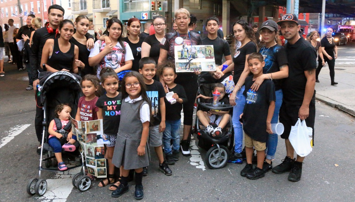 Erasema Delgado, 58, stands with her children and grandchildren at the March In Black event. Delgado and her family marched for the various friends and family members who’ve lost their lives to drugs and addiction.