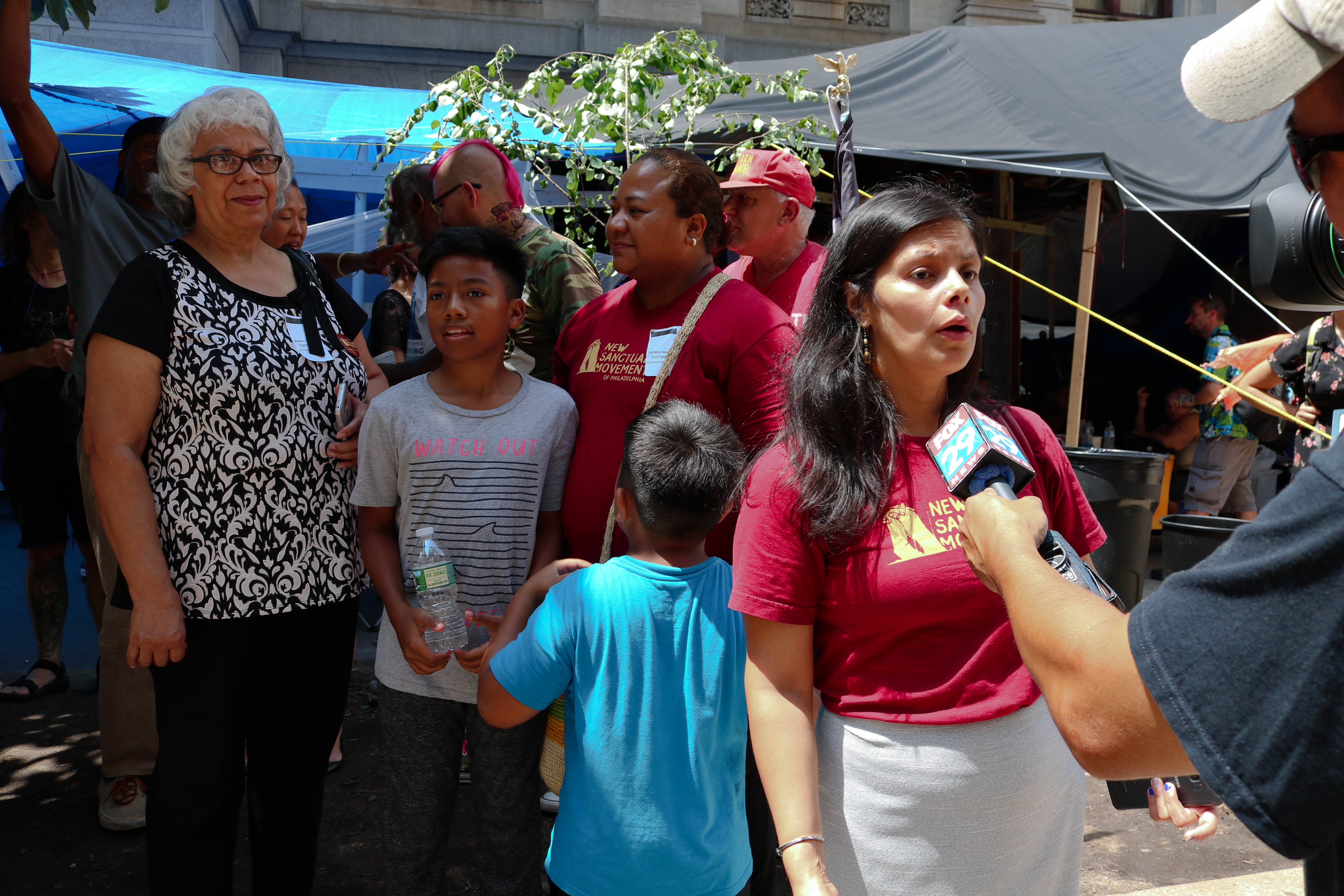 Blanca Pacheco, co-director of the Sanctuary Movement being interviewed by Fox 29 at the Occupy ICE encampment