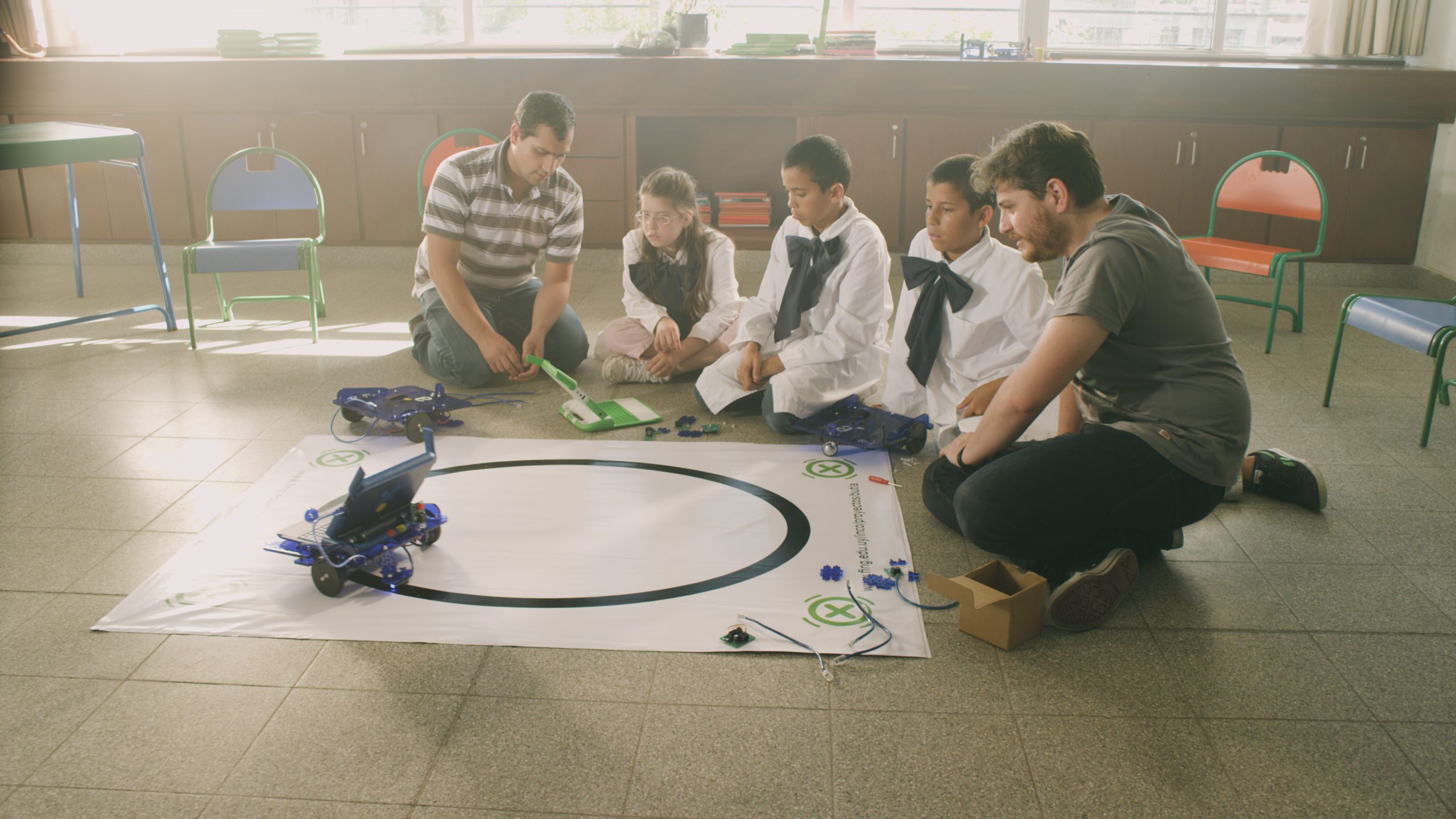 A robotics training class is in session. 